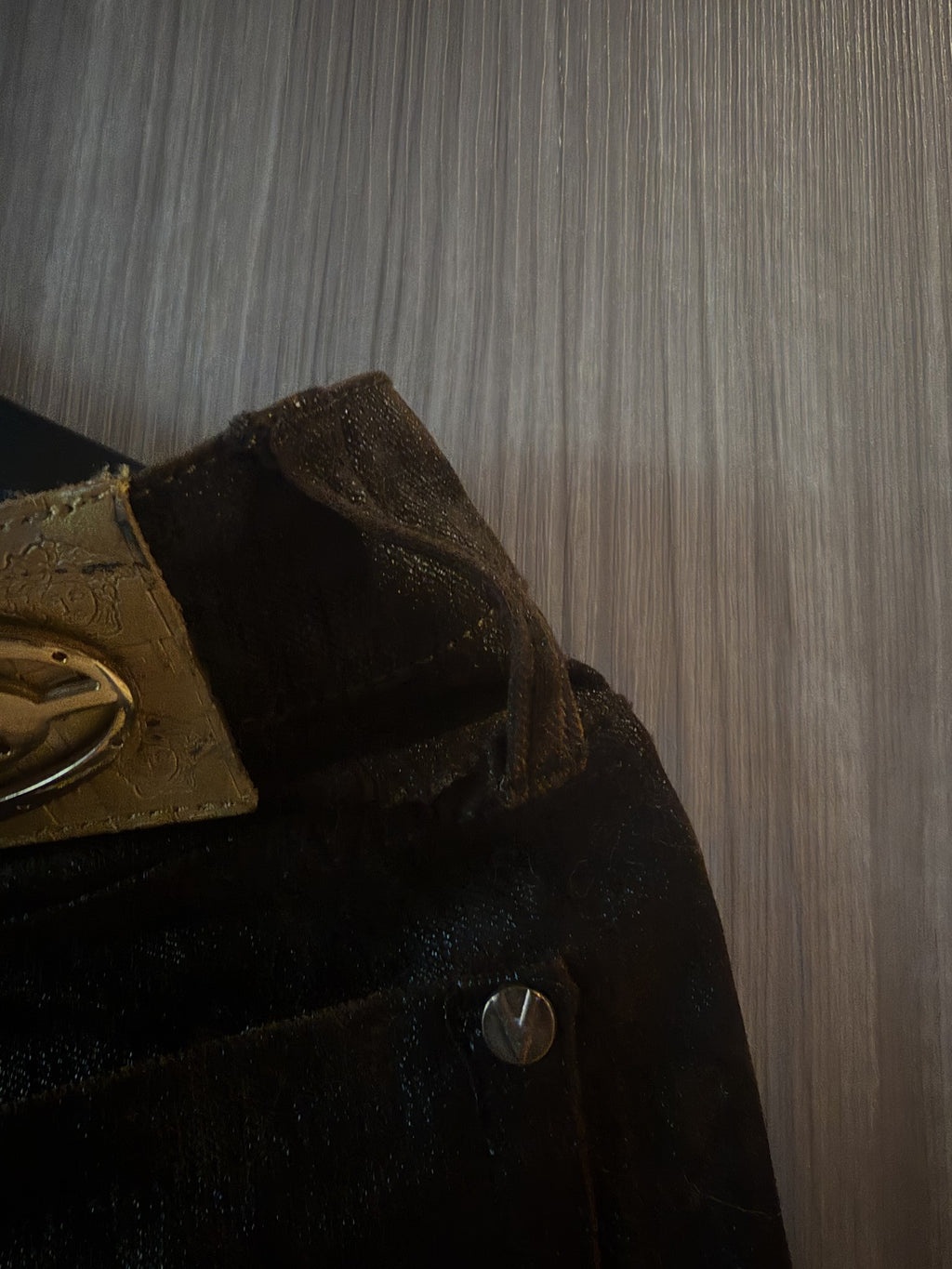 VJC waistband and leather patch detail
